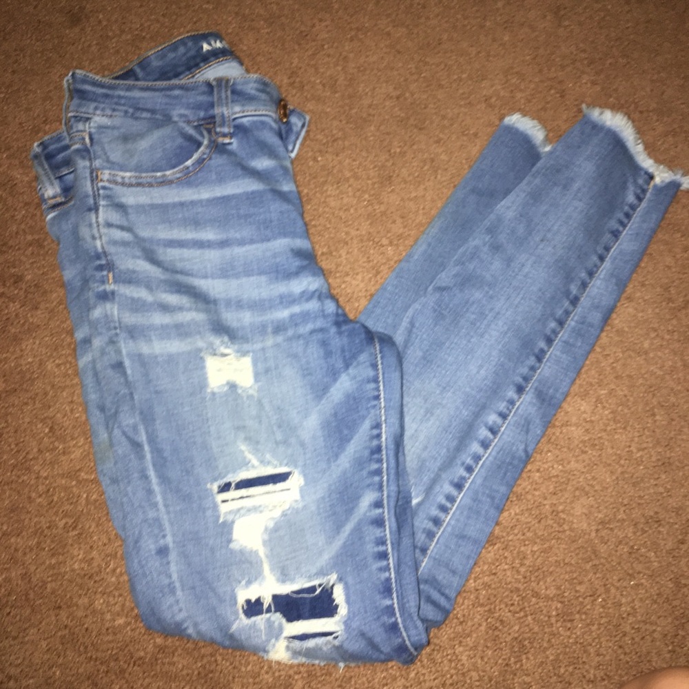 light washed ripped jeans some patches (came with)